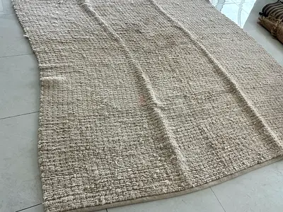 Large neutral beige textured rug