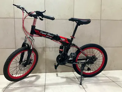 Black and red bicycle for kids/teenagers
