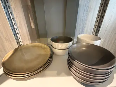 Set of 4ceramic dinner plates and 10 bowls - neutral grey tones