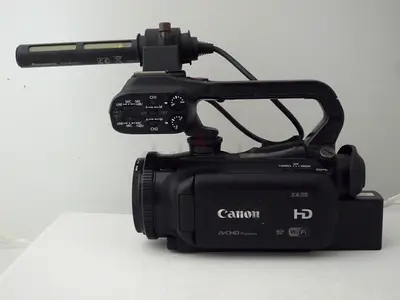 Canon XA25, Professional Camcorder, XLR, and Panasonic Mic.
