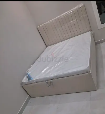 Beige queen storage bed with mattress - good condition