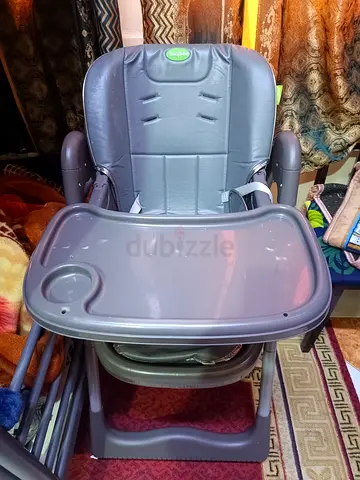 Used grey baby high chair with removable tray - good condition