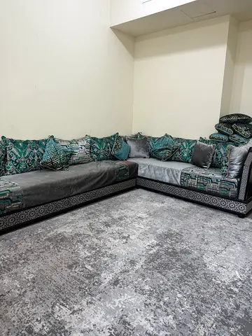 Selling traditional Moroccan living room set tables , pillows and covers included all for 3000