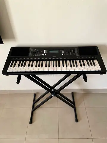 Yamaha keyboard with stand for sale