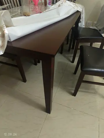 Dark wood dining table with 6 chairs - good condition