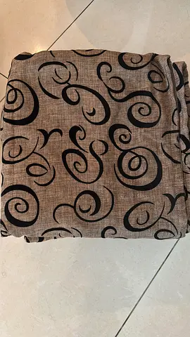 Pair of patterned brown curtains with black swirl design 4 pieces