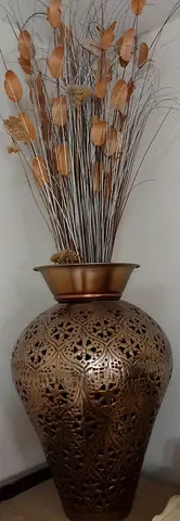Big metal design vase with dry flower