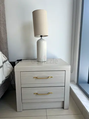 Two Light wood bedside tables with two drawers and brass handles