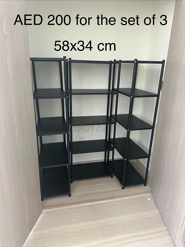 Set of 3 black metal shelving units