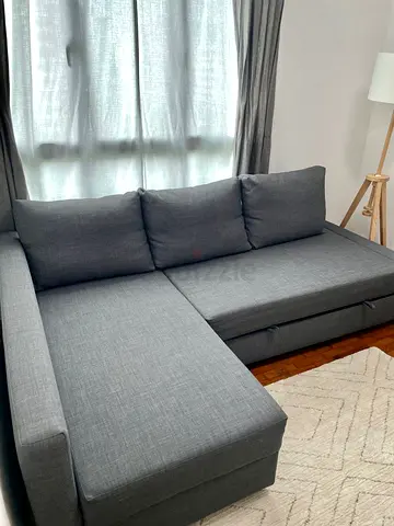 Grey L-shaped Sofa bed with Storage — Good Condition