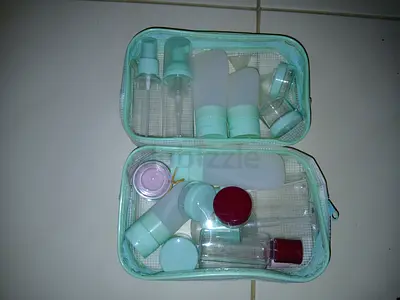 Travel toiletry bottle and container set with zip case - lightly used