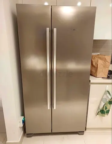 Bosch side by side refrigerator same like a new condition perfect working