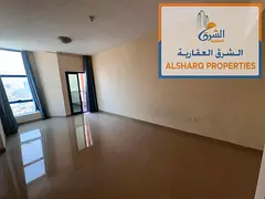 2BR in Al Nuaimiya C, 3 bathrooms, balcony, central AC, free parking & maintenance. Prime location n