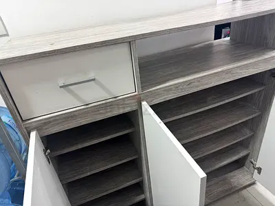 Compact shoe cabinet with shelves and top drawer - light grey wood