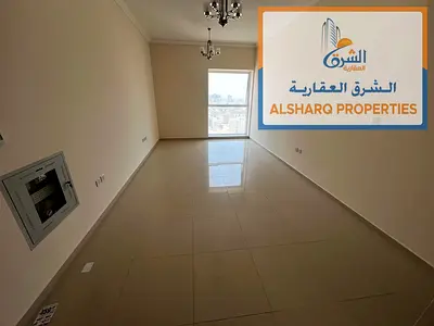 One bedroom and living room for annual rent near Ajman Corniche, with a master bedroom and built-in wardrobes. Air conditioning is included.