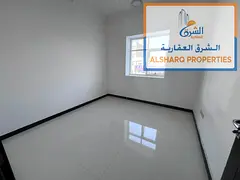 Two bedrooms and a living room - Prime location - Central air conditioning - Easy access to Sharjah
