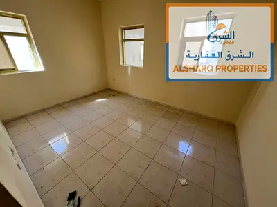 One bedroom and living room for annual rent - spacious - central air conditioning - free maintenance - close to the Dubai and Sharjah exit