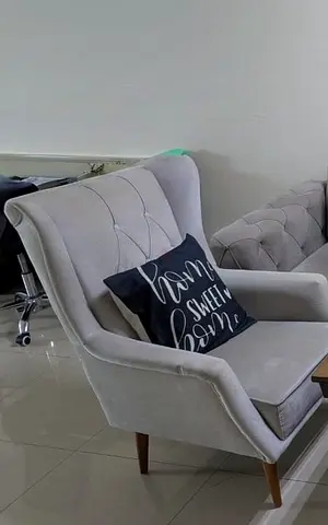 2x Grey tufted armchair in excellent condition
