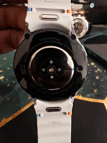 Used Samsung Galaxy Watch 7 44mm (white strap) - like new with box and charger