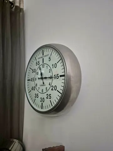Timothy Outlon Wall Clock