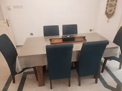 Solid Wood Dining Table with 6 Upholstered Chairs - Good Condition