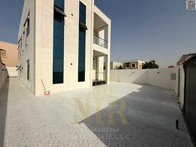 Luxury villa in Al Rawda 3, corner unit, 5000 sq ft, two floors and roof + elevator | On the main s
