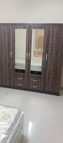 I'm selling brand new 4-door cabinet