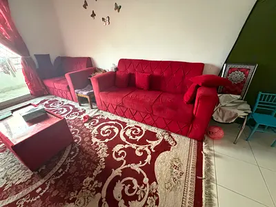 Red 7- seater sofa with coffee table, good condition
