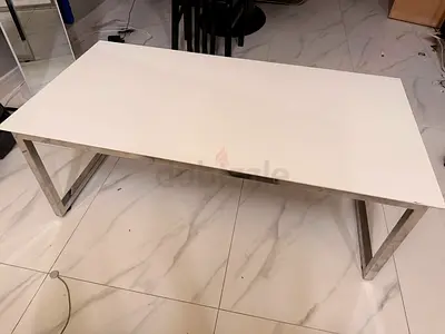 Simple white coffee table with metal legs - good condition