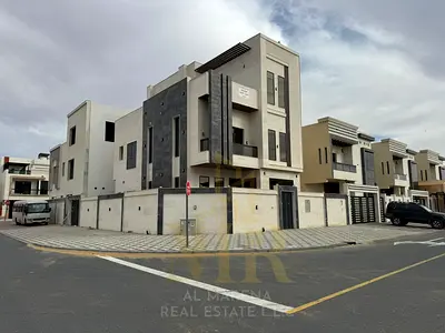 Corner Villa for Sale in Al Bahia | 7 Master Bedrooms | Two Floors & Roof | Spacious Yard