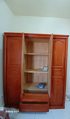 Solid wood 3-door wardrobe with drawers - good condition