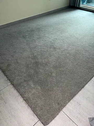 Large grey solid area carpet - good condition