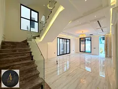 Luxury villas in Ajman with a swimming pool and yard, classic design, central air conditioning, 6 ma