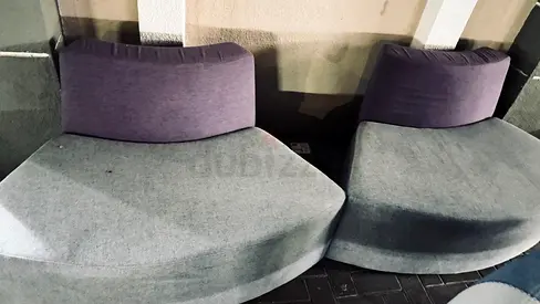 Pair of curved lounge chairs - grey upholstery, good condition