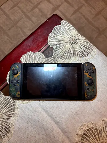 Nintendo Switch (handheld) with camo Joy-Con shells - used, working