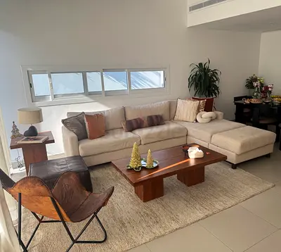 Light beige L-shaped sectional sofa