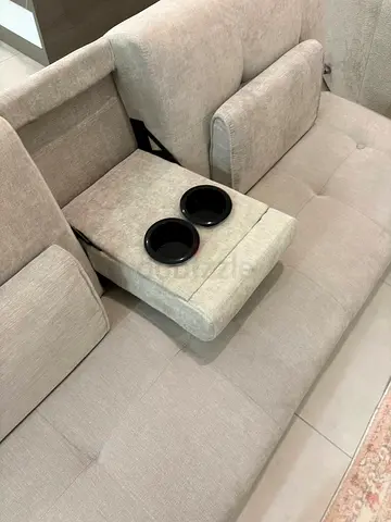 Light Beige Fabric Sofa with Built-in Cup Holders. Can be a bed too!