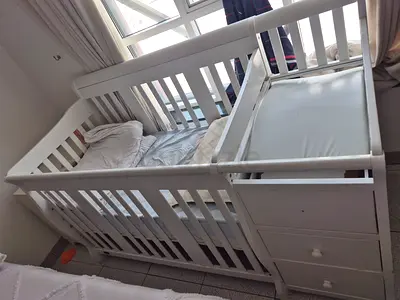 White Convertible Baby Crib with Attached Dresser/Changer original price 1500...with mattress includ
