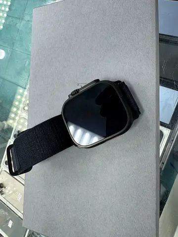 Used square touchscreen smartwatch with fabric strap – good condition