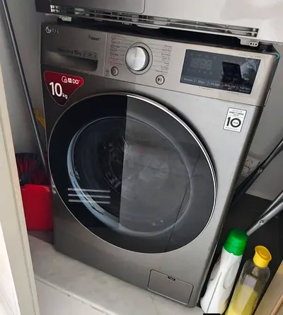 LG 10kg Front Load Washing Machine - Stainless Steel, Good Condition