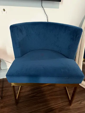 Blue velvet accent lounge chair with brass legs