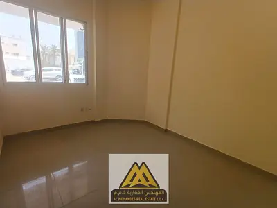 Studio for annual rent – ​​Liwara 2, Al Bustan, Ajman. Semi-separate kitchen, central air conditioning, free maintenance.