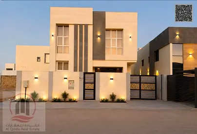 Villa for sale in Ajman, Al Helio area, including electricity and air conditioning. It consists of