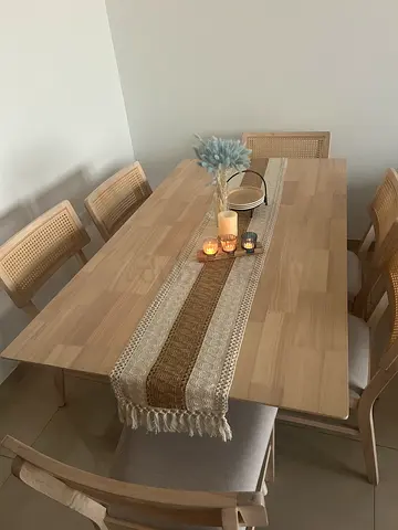 Solid wood dining table with 6 rattan-back chairs