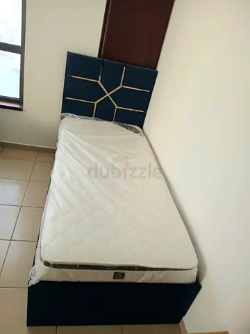 Single bed frame with mattress - navy upholstered with headboard