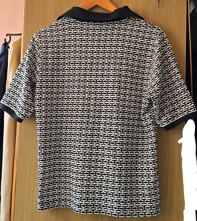 Black & white patterned polo shirt, good condition