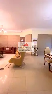 For sale: a three-bedroom apartment with a living room in Al Majaz 3, with an open view from the bal