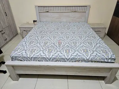 Bed with side tables