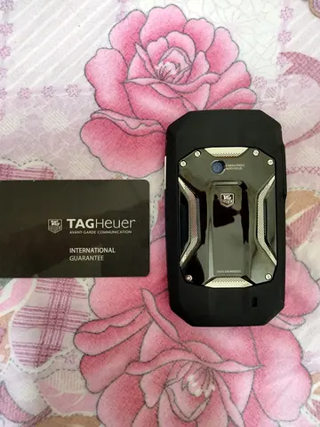 TAG Heuer rugged mobile phone with international guarantee card