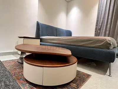 Leaf shaped table with drawer